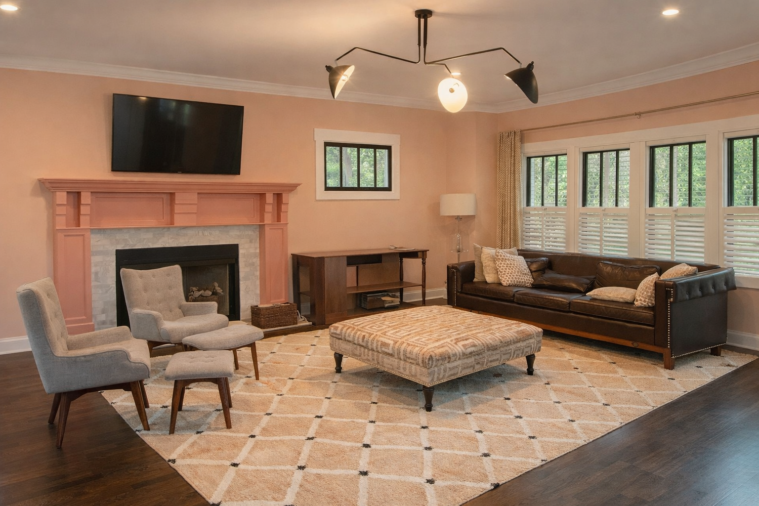 Warm peach living room with dark hardwood floors