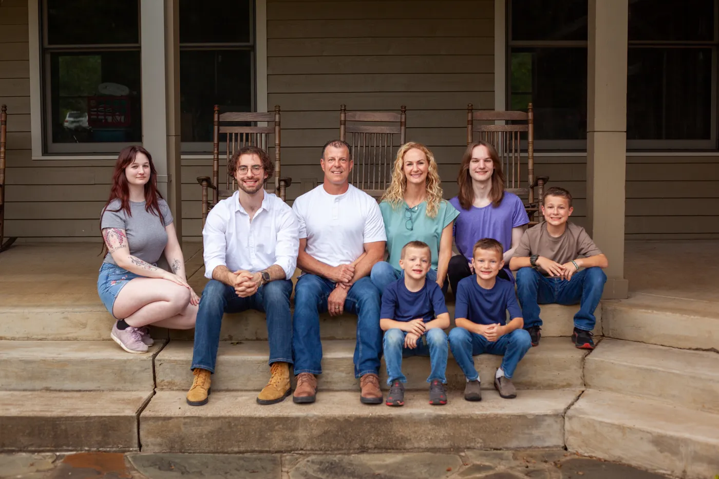 The Robinson family, including Alan, Beth and Sawyer Robinson, on the front porch of their Nashville-area home
